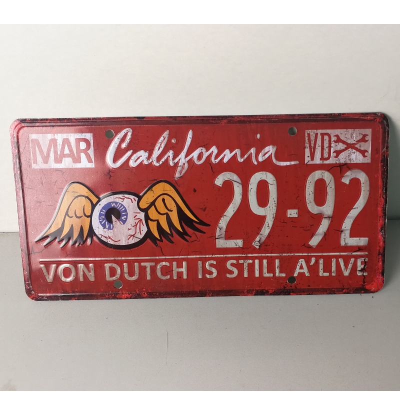 Kim loại dập nổi biển số xe